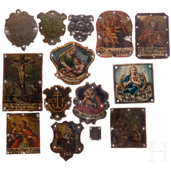 14 painted iron and brass plaques (badges), some dated, 18th/19th century