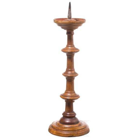 A German turned wood disc candlestick, 16th/17th century