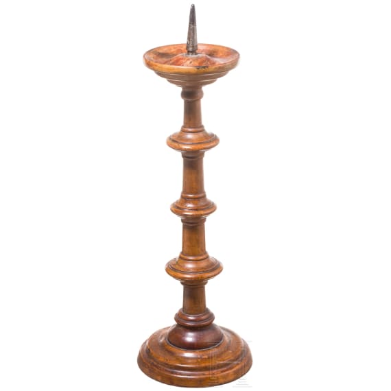 A German turned wood disc candlestick, 16th/17th century