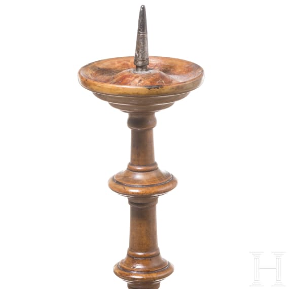 A German turned wood disc candlestick, 16th/17th century