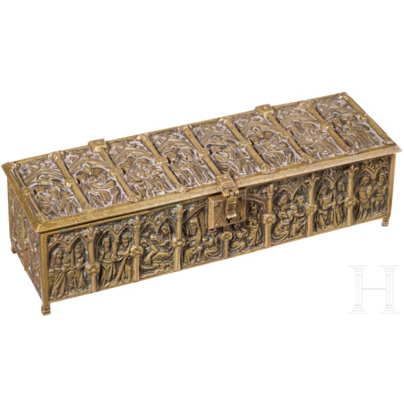 A brass casket showing saints, circa 1900