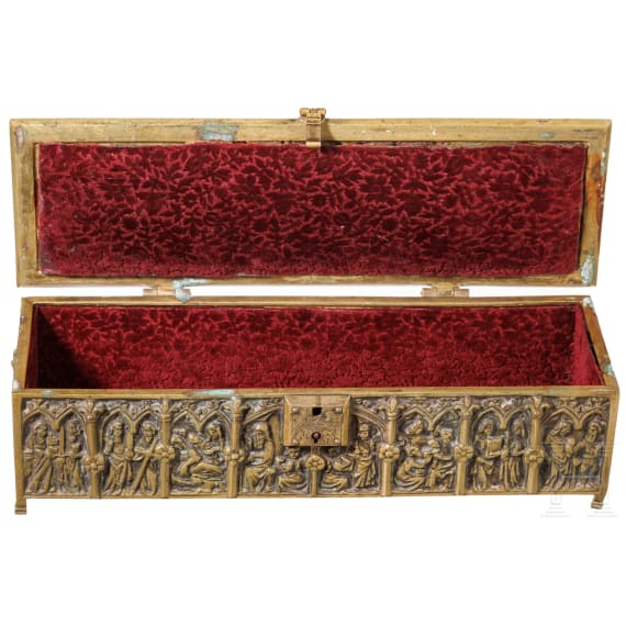 A brass casket showing saints, circa 1900