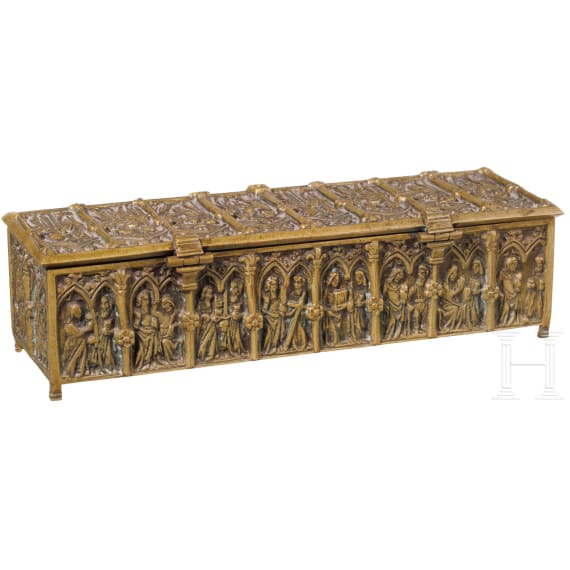 A brass casket showing saints, circa 1900