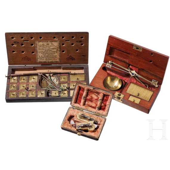 Two German/English coin scales and a scarifier, 18th century
