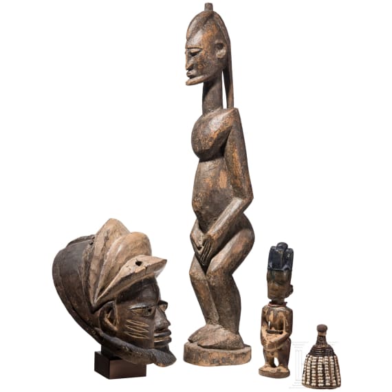 A Nigerian/Malian Gelede mask, ibori and two figures, 20th century