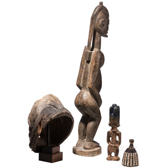 A Nigerian/Malian Gelede mask, ibori and two figures, 20th century