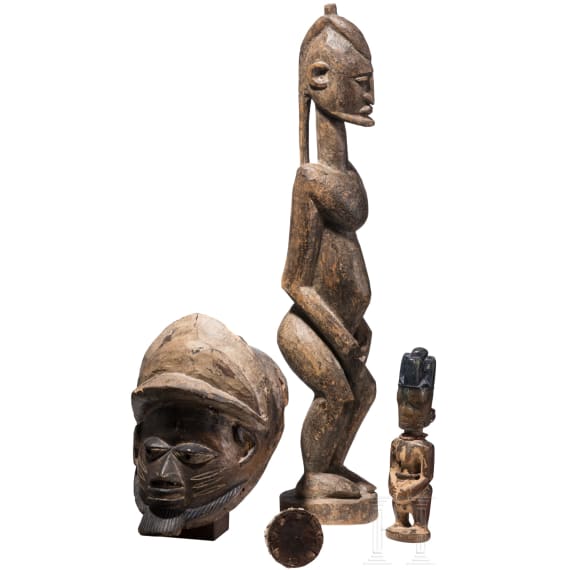 A Nigerian/Malian Gelede mask, ibori and two figures, 20th century