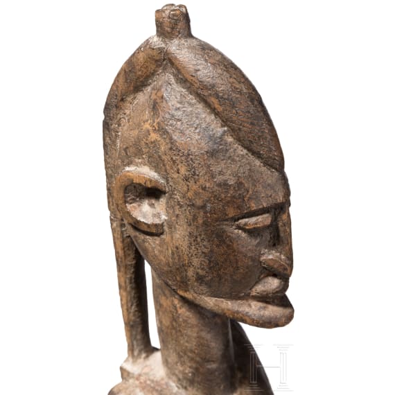 A Nigerian/Malian Gelede mask, ibori and two figures, 20th century