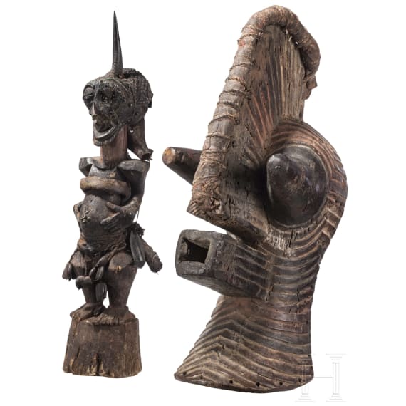 A Congolese Nkisi magic figure and a large Kifwebe mask of the Songye