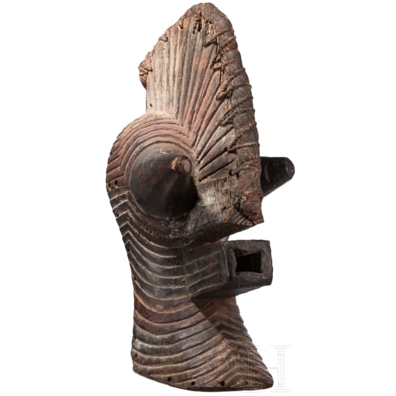A Congolese Nkisi magic figure and a large Kifwebe mask of the Songye