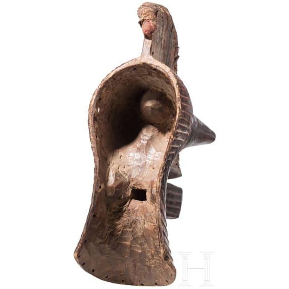 A Congolese Nkisi magic figure and a large Kifwebe mask of the Songye