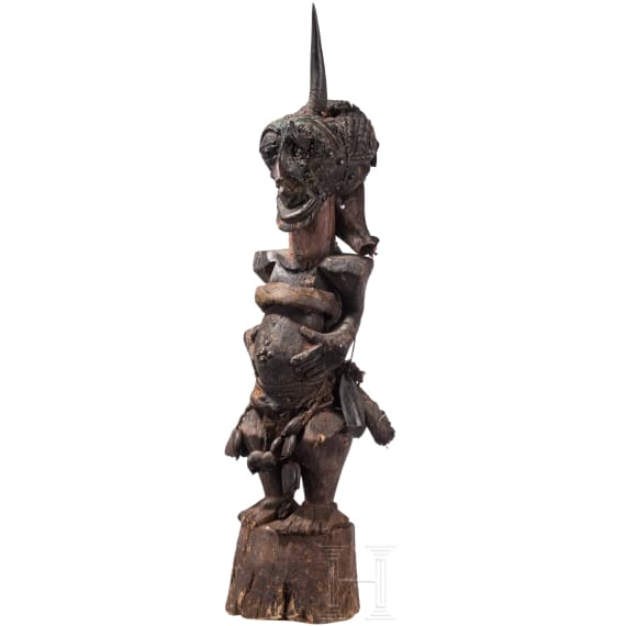 A Congolese Nkisi magic figure and a large Kifwebe mask of the Songye