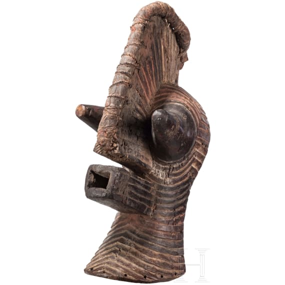 A Congolese Nkisi magic figure and a large Kifwebe mask of the Songye