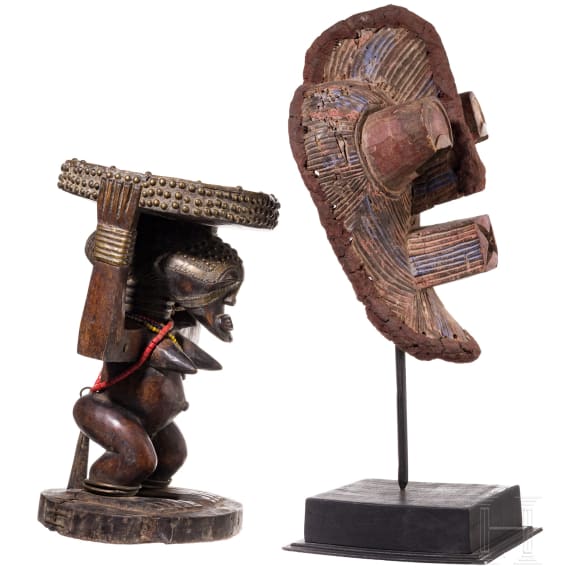 A Congolese caryatid stool and a kifwebe mask of the Songye people
