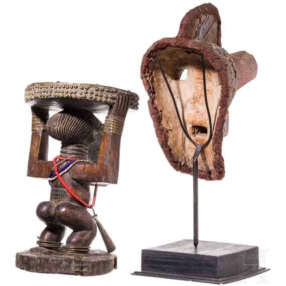 A Congolese caryatid stool and a kifwebe mask of the Songye people