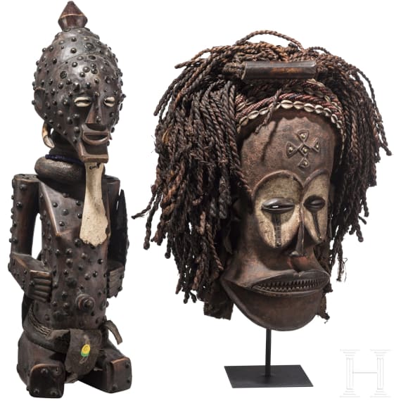 A Congolese cihongo mask of the Chokwe and a small Songye "fetish figure"