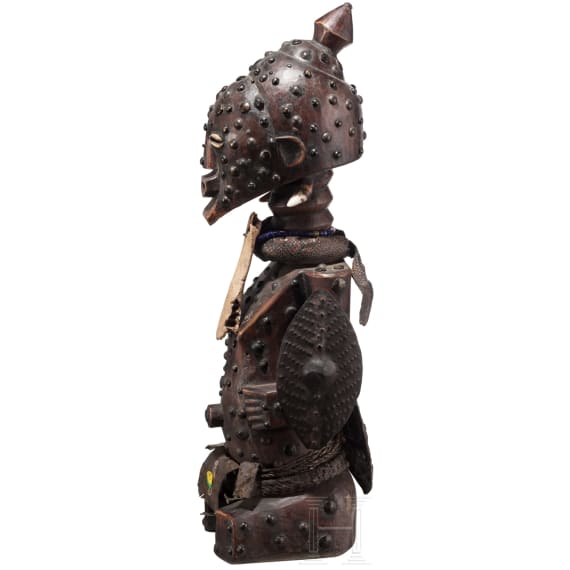 A Congolese cihongo mask of the Chokwe and a small Songye "fetish figure"
