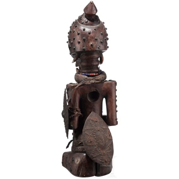 A Congolese cihongo mask of the Chokwe and a small Songye "fetish figure"