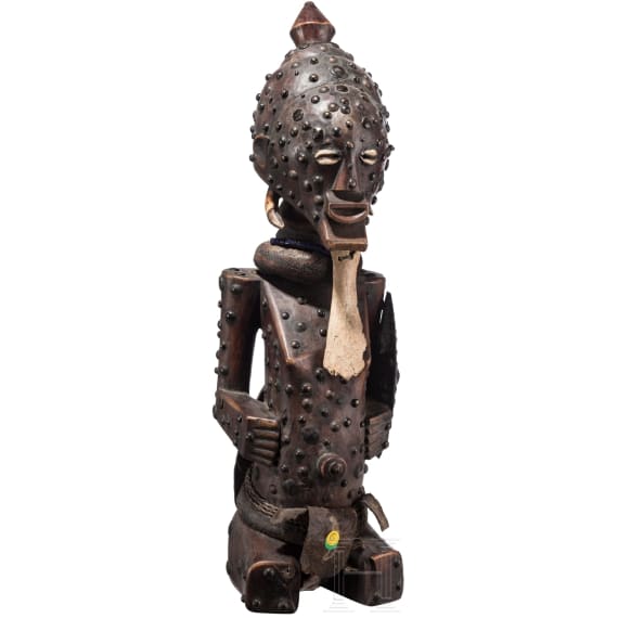 A Congolese cihongo mask of the Chokwe and a small Songye "fetish figure"