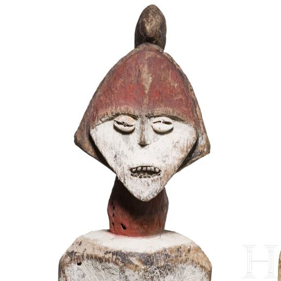 A pair of Gabonese/Congolese standing Kota (Mbete) reliquary figures