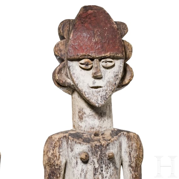 A pair of Gabonese/Congolese standing Kota (Mbete) reliquary figures