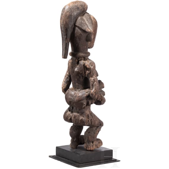 A Gabonese female figure of the Punu and a relic shrine of the Fang, 20th century