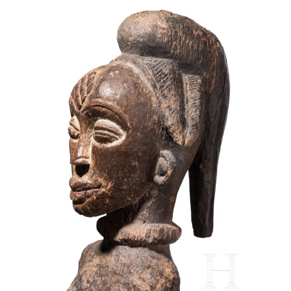 A Gabonese female figure of the Punu and a relic shrine of the Fang, 20th century