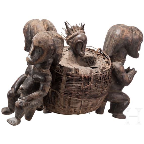 A Gabonese female figure of the Punu and a relic shrine of the Fang, 20th century