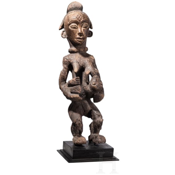 A Gabonese female figure of the Punu and a relic shrine of the Fang, 20th century