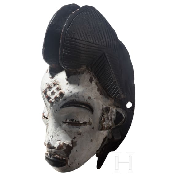 An Okuyi mask of the Punu in Gabon, 20th century