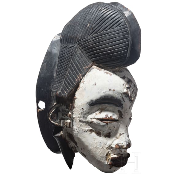 An Okuyi mask of the Punu in Gabon, 20th century