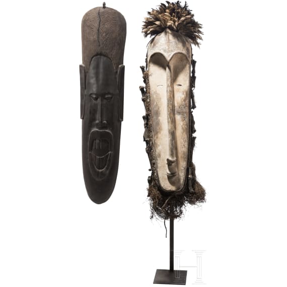A Gabonese Fang mask and a Kenyan Maasai mask