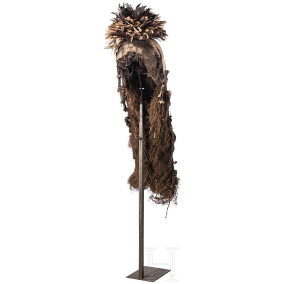 A Gabonese Fang mask and a Kenyan Maasai mask