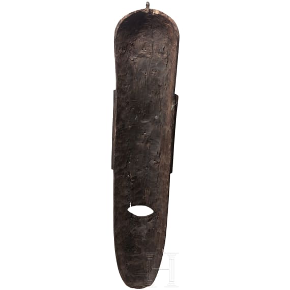 A Gabonese Fang mask and a Kenyan Maasai mask