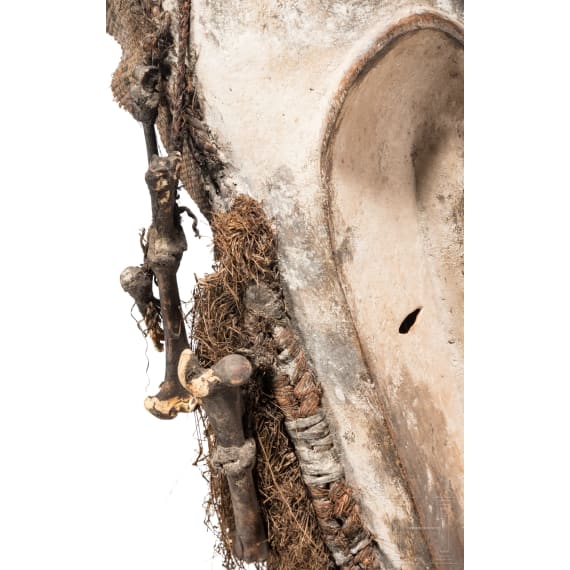 A Gabonese Fang mask and a Kenyan Maasai mask