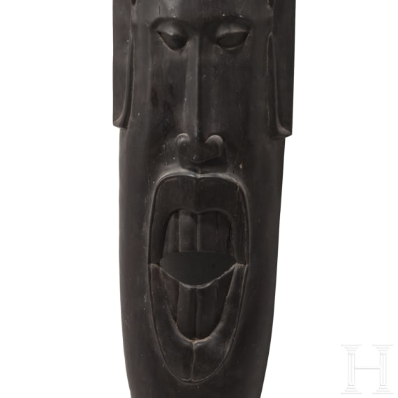 A Gabonese Fang mask and a Kenyan Maasai mask