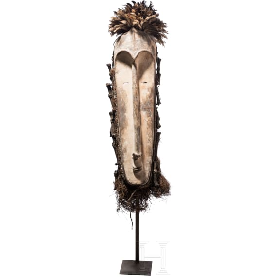 A Gabonese Fang mask and a Kenyan Maasai mask