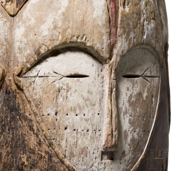 A Gabonese four-faced helmet mask (ngontang) of the Fang people, 20th century