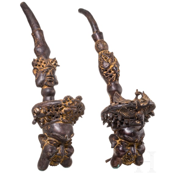 A pair of Cameroonian Bamum pipe-shaped bronzes
