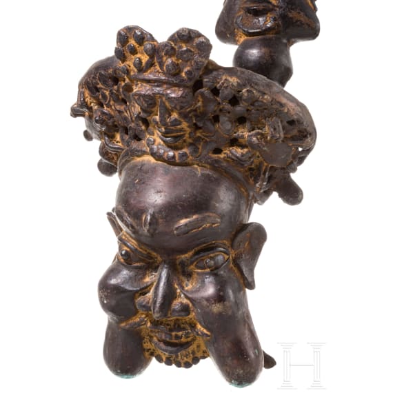 A pair of Cameroonian Bamum pipe-shaped bronzes