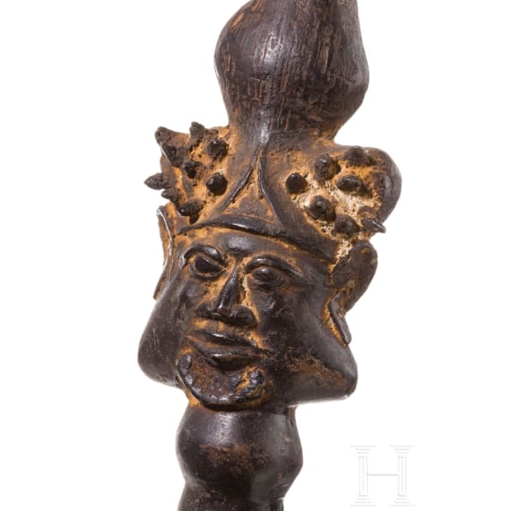 A pair of Cameroonian Bamum pipe-shaped bronzes