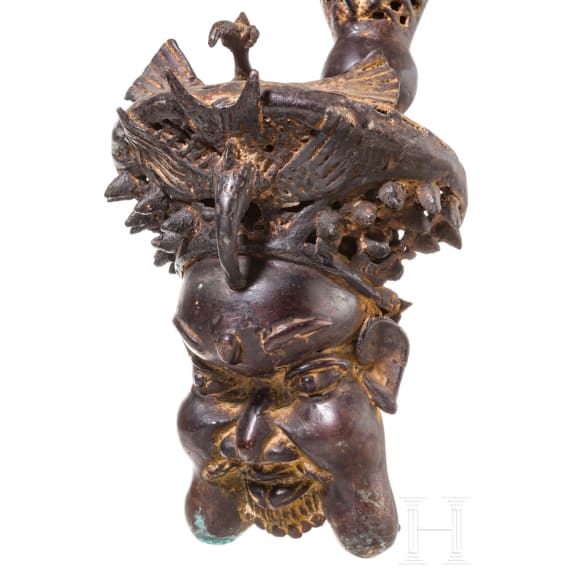 A pair of Cameroonian Bamum pipe-shaped bronzes