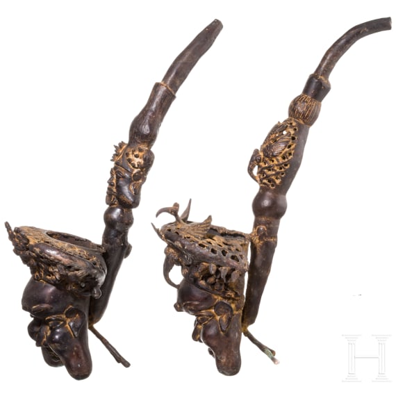 A pair of Cameroonian Bamum pipe-shaped bronzes