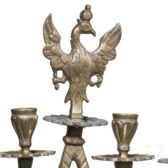 A four-light brass candelabra with double eagle, circa 1900