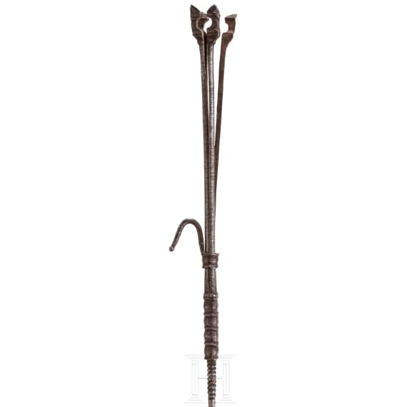 A German iron ember holder for lighting pipes, circa 1700