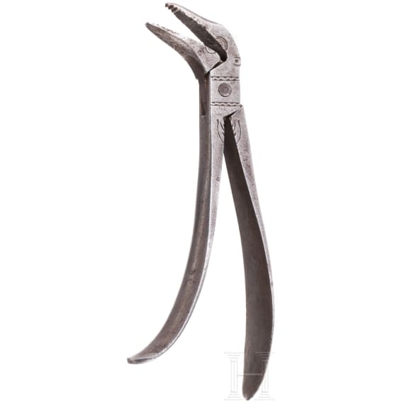 A pair of German engraved iron dental tongs, circa 1800