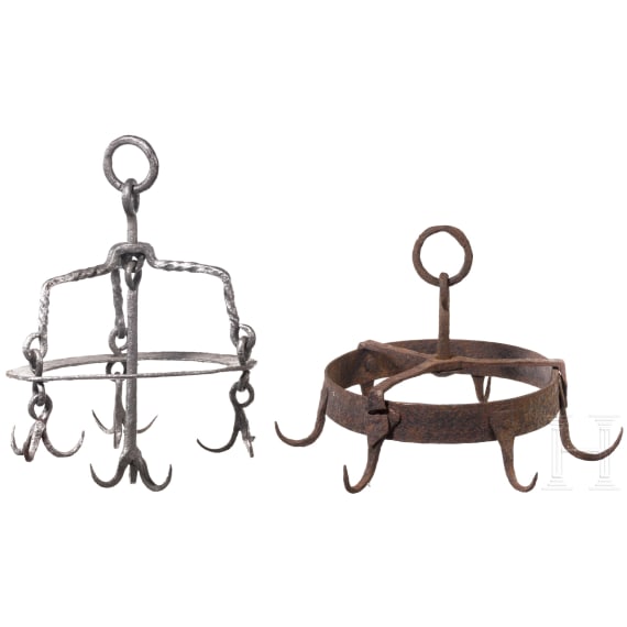 Two German wrought-iron butcher's crowns, 17th/18th century