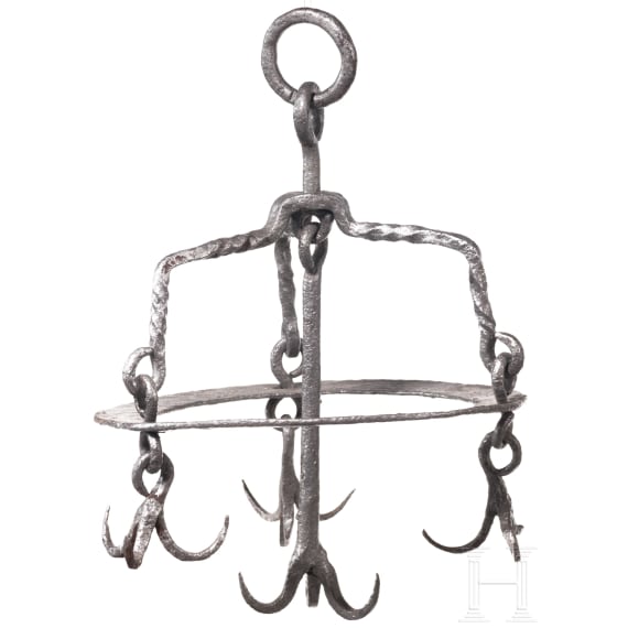 Two German wrought-iron butcher's crowns, 17th/18th century