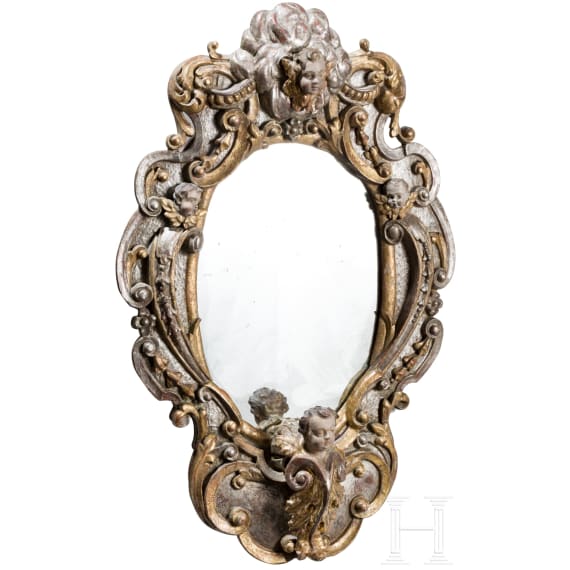 A partially gilded Italian wooden Baroque mirror, circa 1720