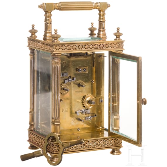 An antique French travelling clock with alarm function, late 19th century
